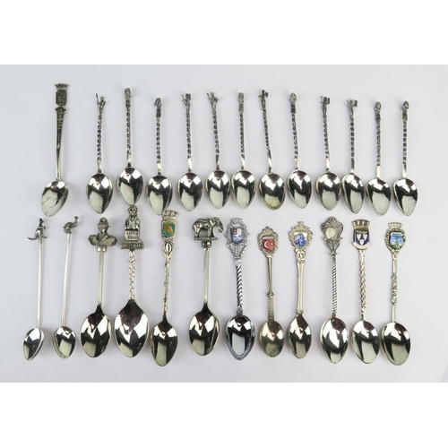 752 - A collection of African silver coffee spoons, together with assorted plated souvenir spoons.