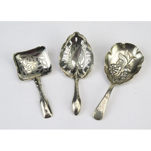 769 - Three assorted silver caddy spoons, most marks rubbed and worn, total weight of silver 25gms, 0.83oz... 