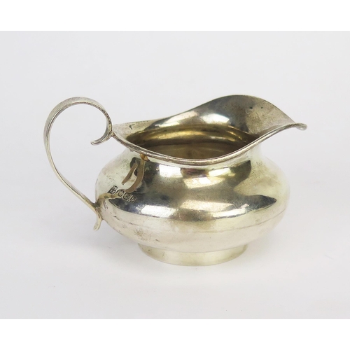 782 - An Edward VII silver circular cream jug, maker Thomas Bradbury & B Sons Ltd, Sheffield, 1906, of squ... 