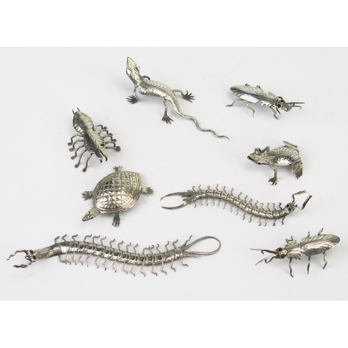 786 - A collection of Indian silver menu holders modelled as insects, lizard and other beetles, total weig... 