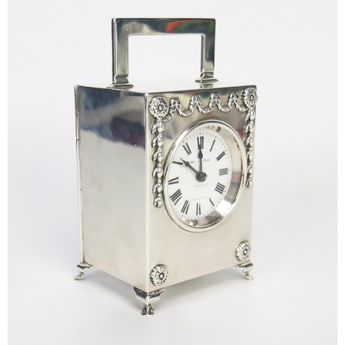 790 - A George V silver carriage clock, maker Mappin & Webb, London, 1910, the rectangular case with hinge... 