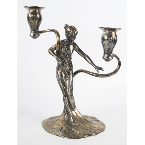 794 - WMF, a pair of Jugendstil silver plated figural twin branch candelabra, the sconces on sinuous swept... 