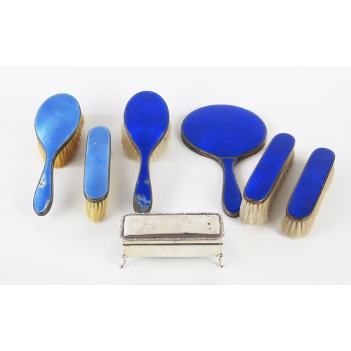 798F - A George V silver and enamel dressing table set, Birmingham, 1929, includes hand mirror, clothes and... 