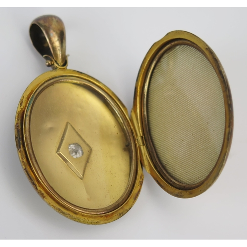 88 - A Victorian Gilt Metal and Old Cut Diamond Locket, 56mm drop, c. 4.3x4.1mm stone, 16g