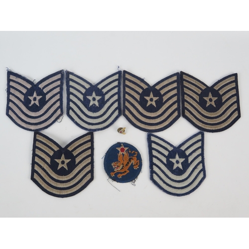 914 - U.S. Airforce Master Sergeant cloth badges x 6 , two metal lapel badges and another cloth badge.