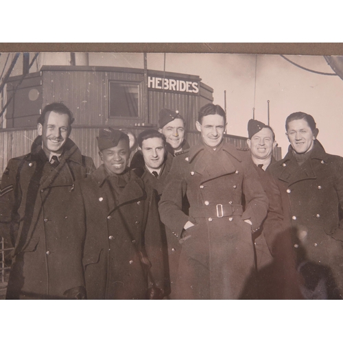 917 - A personal album of photographs of R.A.F. personnel, aircraft, Montgomery, King George VI and native... 