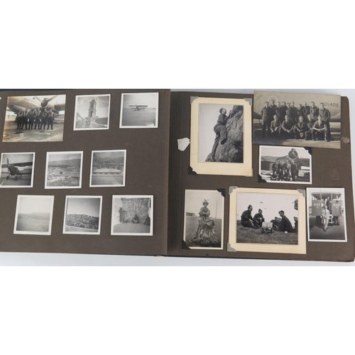 917 - A personal album of photographs of R.A.F. personnel, aircraft, Montgomery, King George VI and native... 