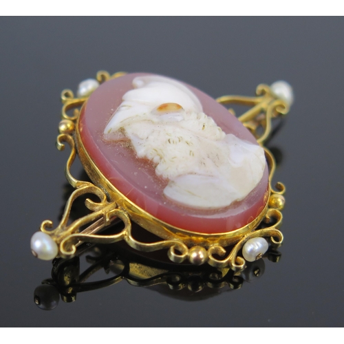 92 - A 19th Century Hardstone Cameo Brooch decorated with a classical bust of a soldier in profile and in... 