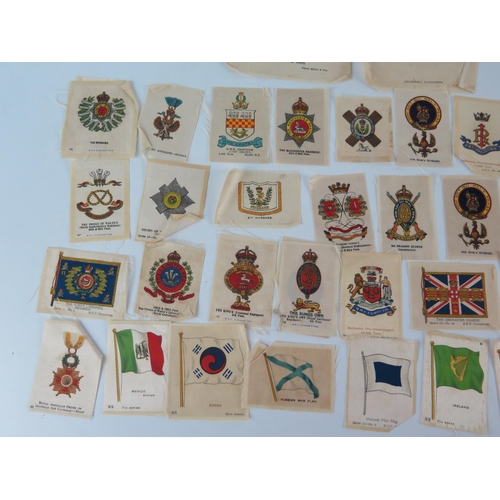 920 - A collection of Kensitas cigarette silks, includes Regimental badges, Regimental Colour, and General... 