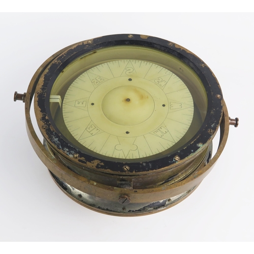 925 - A ships brass gimbal mounted compass, stamped 