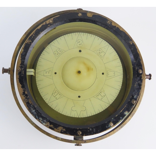 925 - A ships brass gimbal mounted compass, stamped 