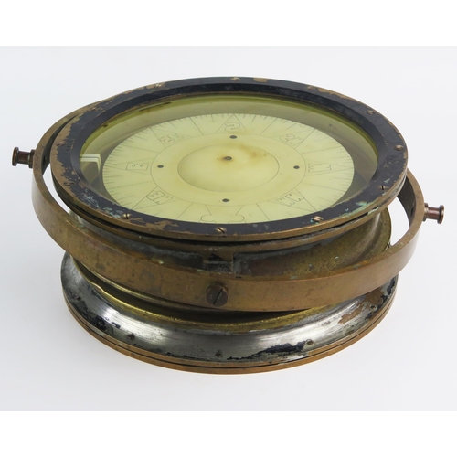 925 - A ships brass gimbal mounted compass, stamped 