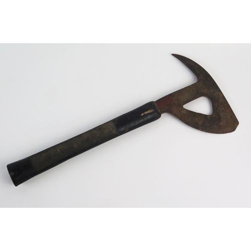 931 - An R.A.F. Bomber Command axe, with shaped and pierced head, having a rubberoid handle to the shaft, ... 