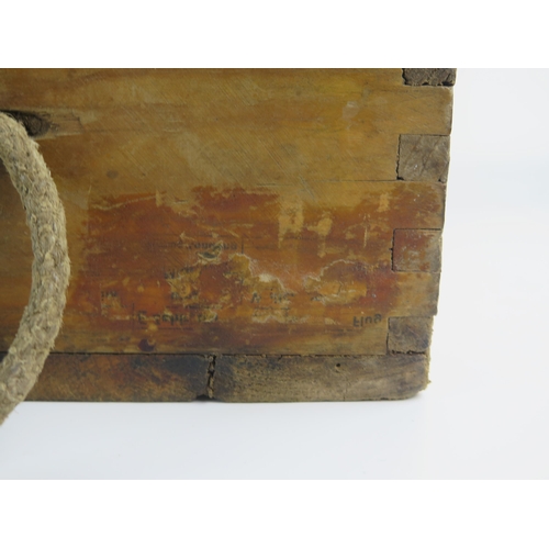 933 - A German stained wood ammunition box, with hinged lid and metal clasp, stencilled marks.45cm long.