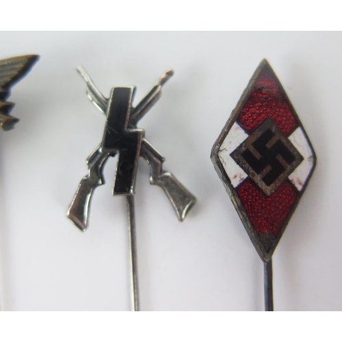 941 - A Hitler Youth enamel lapel badge, miniature wounds lapel badge and three others.