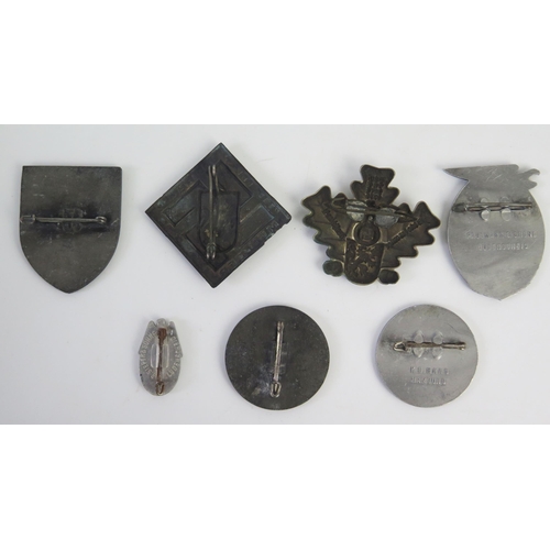 958 - A Third Reich period Nordmark-Treffen 1936 badge, together with six other assorted badges and tinnie... 