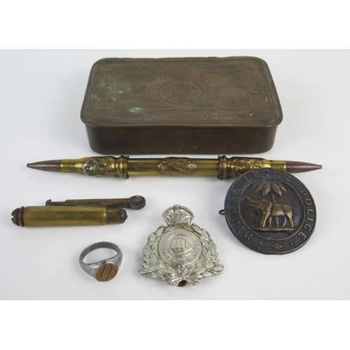 961 - A World War One Princess Mary presentation box, with trench art lighter, pen holder, Sierra Leone Po... 