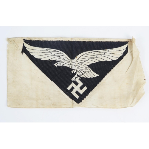 965 - A Third Reich period, Luftwaffe printed cloth sports vest badge.