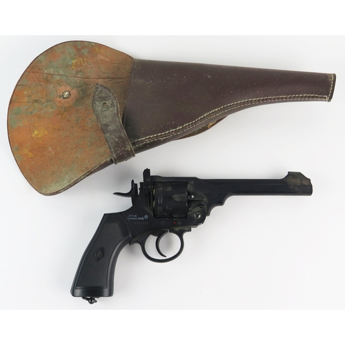 978 - A replica Webley MKVI six shot .177 calibre air pistol, with leather holster.