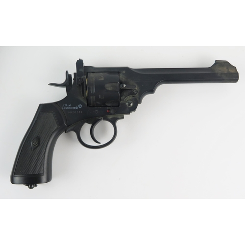 978 - A replica Webley MKVI six shot .177 calibre air pistol, with leather holster.