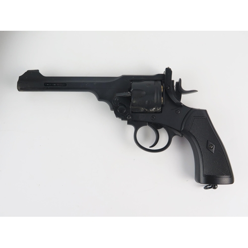 978 - A replica Webley MKVI six shot .177 calibre air pistol, with leather holster.