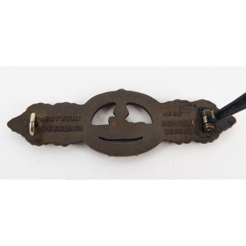 980 - A replica bronze U-Boat clasp, marked to the back Entwurf Peekhaus AUSF, Schwerin, Berlin 68. 7.6cm ... 