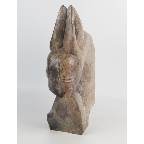 1332 - Brighton Sango (1958-1995), abstract sculpture of a fawn, serpentine stone, 38cm.