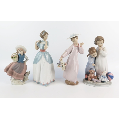 1371 - Four Lladro porcelain figurines, all of young children, 17cm and 23cm high, (4).