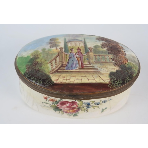 1572 - A 19th century Staffordshire enamel oval box, the hinged lid decorated with a view of an figures in ... 