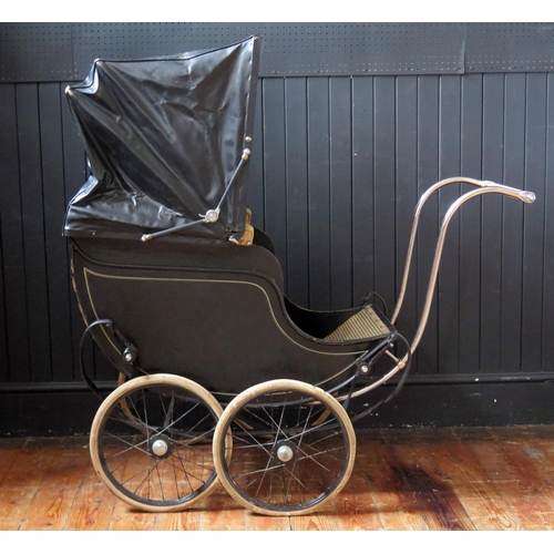 1650 - Treasure Cot Co. London, an early 20th century painted wood and canvas pram,  with black and lined c... 