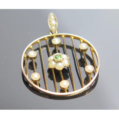 110 - An Antique untested Pearl and Green Stone Pendant in an unmarked gold setting, 32.5mm drop, 2g