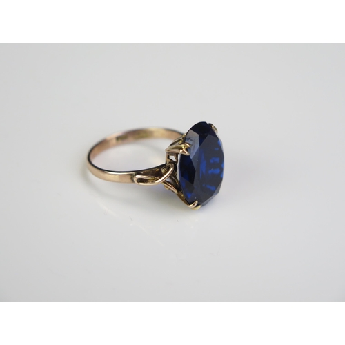 122 - A Chinese 14K Gold and Blue Topaz? Ring, 16x13mm stone, size, O.5, 4.6g