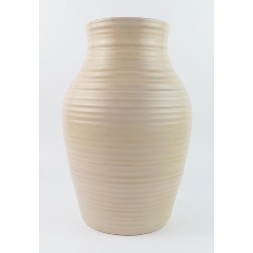 1309 - A Clarice Cliff pottery vase of ovoid form with ribbed decoration, 30cm high, A/F.