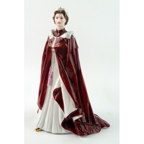 1310 - A Royal Worcester figurine, The queen in Robes of the Order of the British Empire,