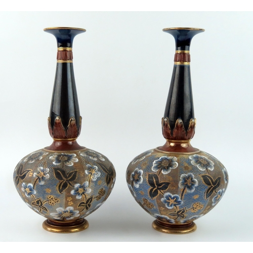 1313 - A pair of Royal Doulton Slater pottery vases, of squat circular form with slender necks with flowerh... 