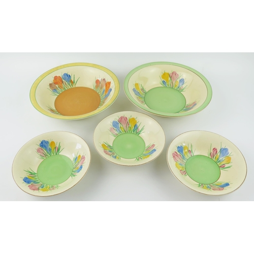 1320 - Two Clarice Cliff Crocus pattern junket bowls, and three smaller cereal bowls, (5)