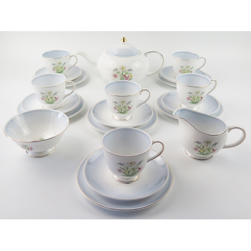 1338 - A Susie Cooper 'Romance Blue' pattern tea service, includes teapot, sugar basin, cream jug, six tea ... 