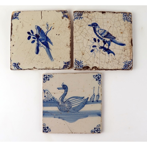 1342 - Three Dutch Delft tiles, each depicting a bird, with ox-head corner motifs, each 13 x 13cm