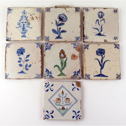 1346 - Seven Dutch Delft blue and white tiles depicting flowers and floral sprays,