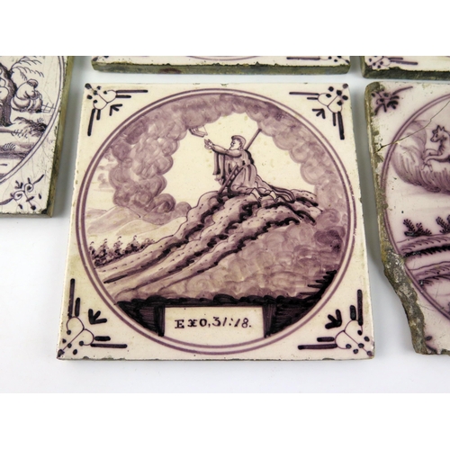 1349 - Five Dutch Delft manganese tiles depicting biblical scenes, each 13 x 13cm.