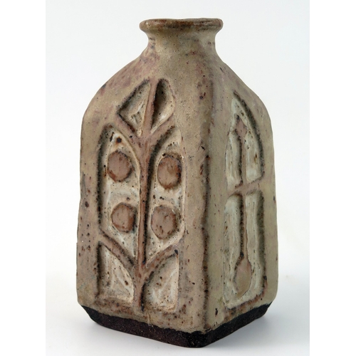 1352 - A studio pottery vase, of rectangular outline, with arched recessed panels, impressed mark to the ba... 