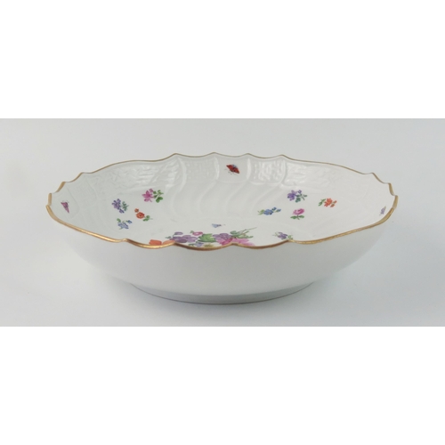 1359 - A Meissen porcelain bowl with painted floral decoration, gilt border, under glaze blue crossed sword... 