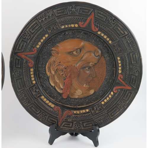 1362 - A Mexican Oaxaca pottery calendar plate, with low relief decoration, 31cm diameter together with ano... 