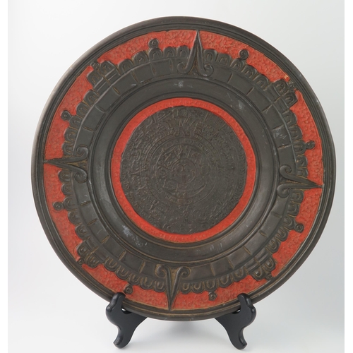 1362 - A Mexican Oaxaca pottery calendar plate, with low relief decoration, 31cm diameter together with ano... 