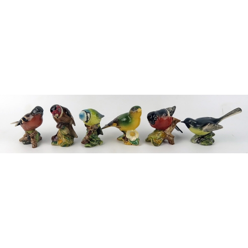 1376 - Six Beswick bird figurines, with black backstamps, includes Goldfinch, Chaffinch, Blue Tit, Bull Fin... 