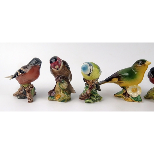 1376 - Six Beswick bird figurines, with black backstamps, includes Goldfinch, Chaffinch, Blue Tit, Bull Fin... 