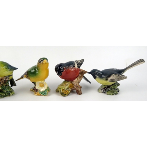 1376 - Six Beswick bird figurines, with black backstamps, includes Goldfinch, Chaffinch, Blue Tit, Bull Fin... 