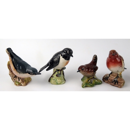 1377 - Six Beswick bird figurines, with black backstamps, includes, Wren, Goldcrest, Robin, Whitethroat, Nu... 