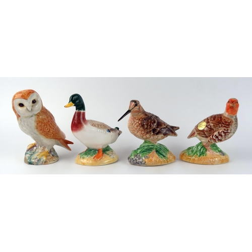 1380 - Four assorted Beswick pottery bird ornaments, includes Owl, Mallard Duck, Snipe and partridge, (4).