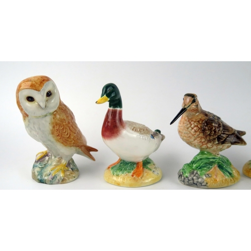 1380 - Four assorted Beswick pottery bird ornaments, includes Owl, Mallard Duck, Snipe and partridge, (4).